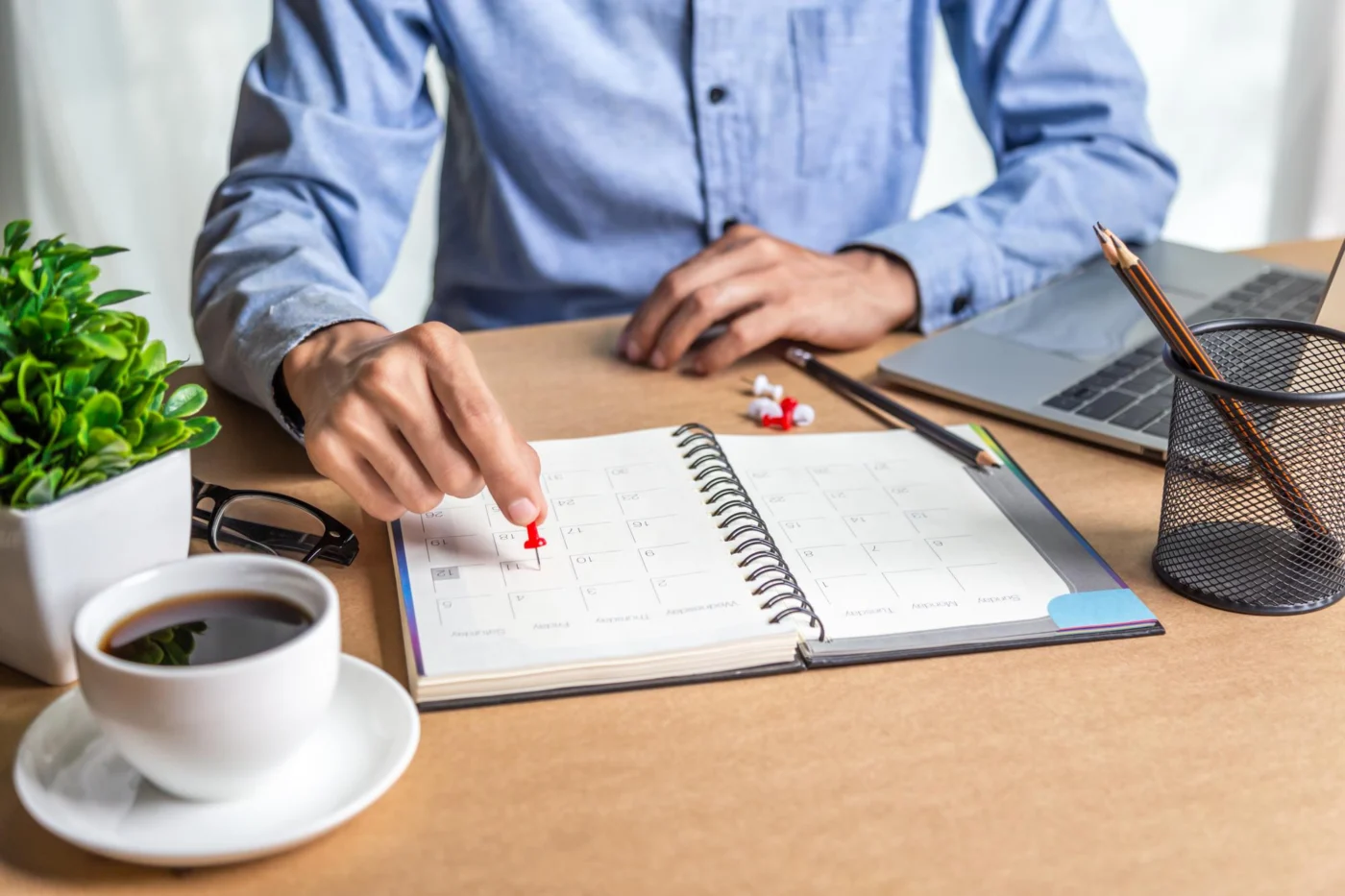 A company director checking filing dates against a calendar