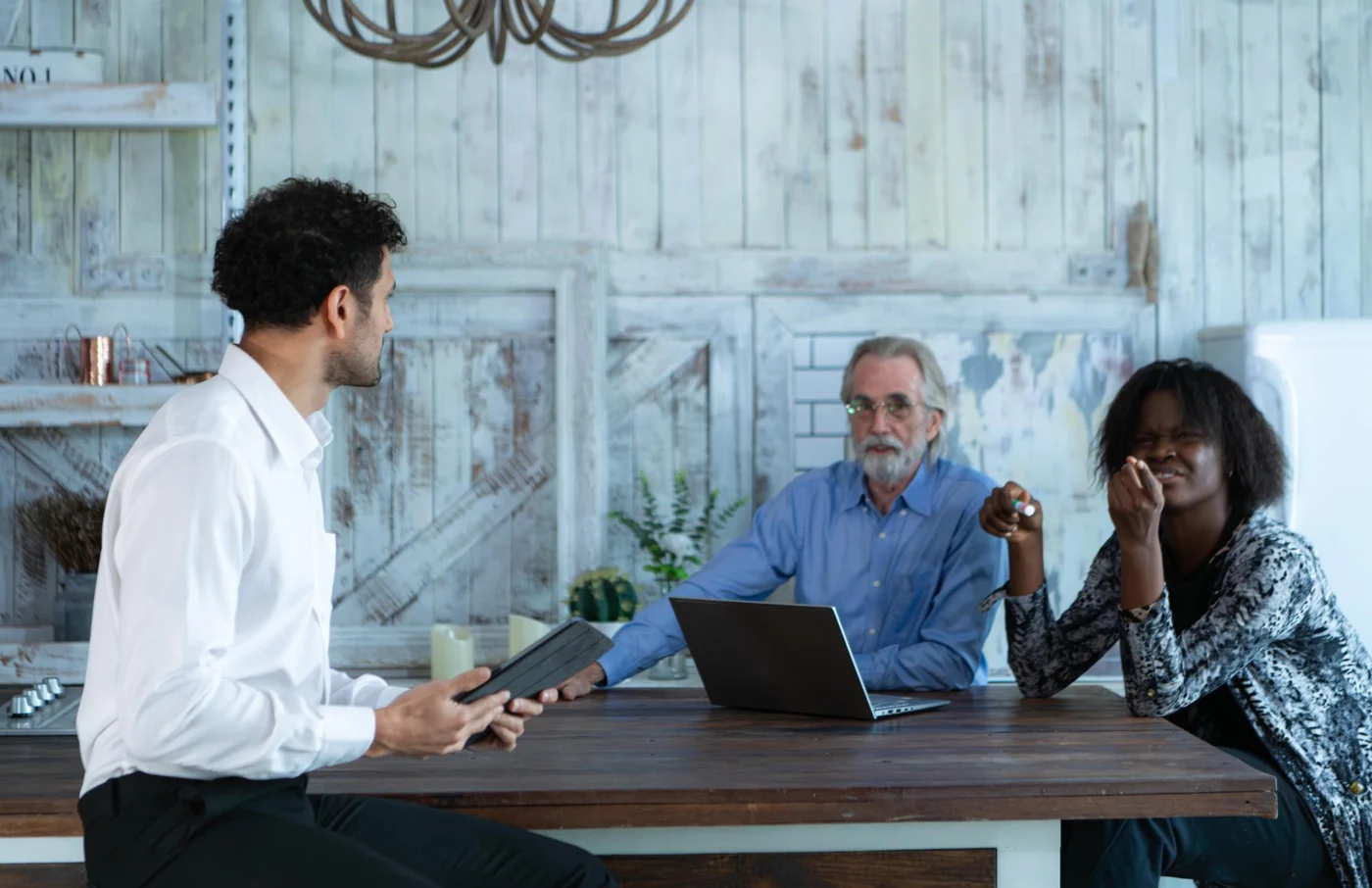 Two business owners discussing figures in a bright modern office