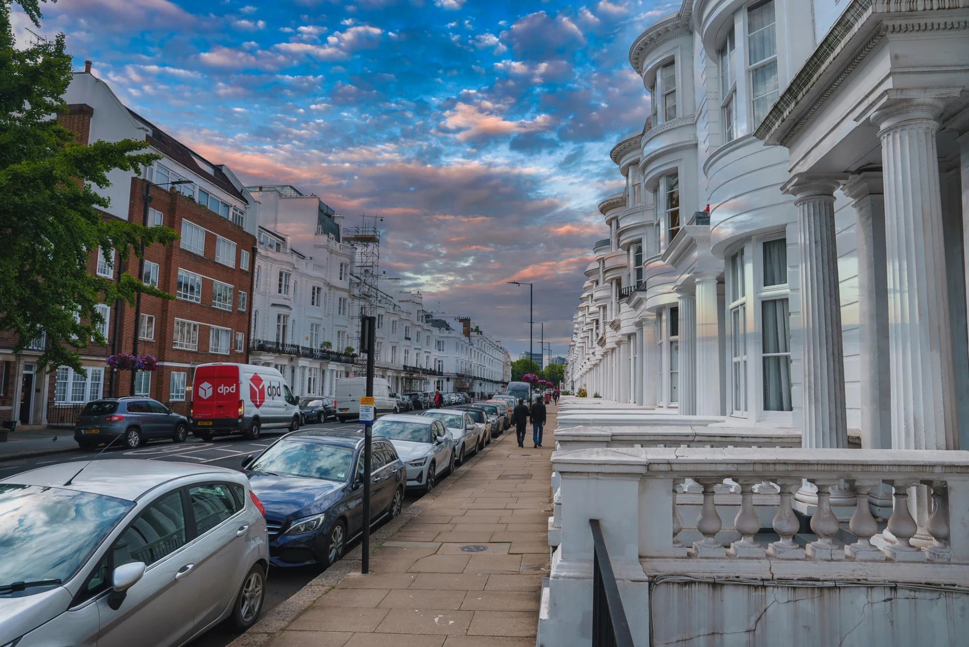 A row of British terraced houses on a residential street